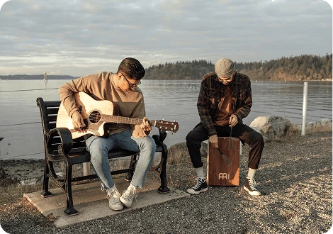 Placeholder: friends jamming outside